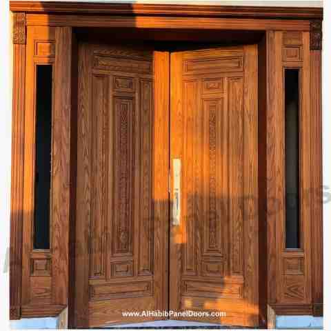 This is Kail Wood Main Double Door. Code is HPD582. Product of Doors - Beautiful two panel kail wood design for main door entrance, available in all sizes also available in Ash wood, kail wood, yellow pine. Al Habib